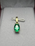 Dije en Oro 18K con Esmeralda Natural Talla Óvalo